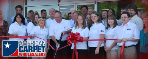 American Carpet Owner and Staff Cut Ribbon At Open House